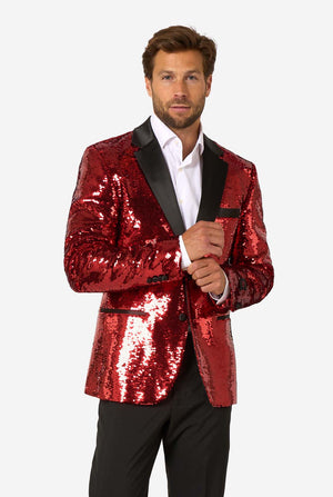 Front view of a man wearing a shiny red sequin blazer with black lapels over a white dress shirt and black trousers.