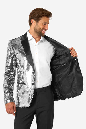Man in a silver sequin blazer holding the jacket open to show the plain black interior lining with an OppoSuits label.