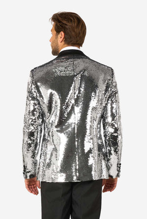 Back view of a man wearing a silver sequin blazer with black satin collar.