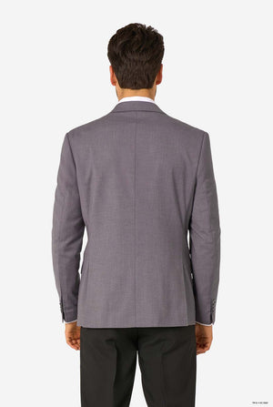 Back view of a man wearing a grey blazer and black trousers, showing the clean tailoring on the back.