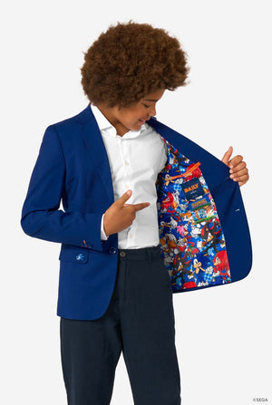 A child showing the inside of a blue blazer lined with colorful Sonic the Hedgehog characters.