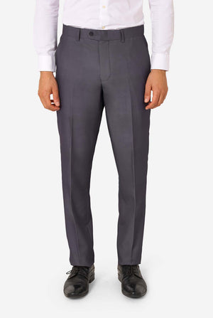 A man is wearing a stylish charcoal colored grey suit with a white dress shirt, looking confidently. Perfect formal outfit for men's special occasions, weddings, and parties. Pants close up.