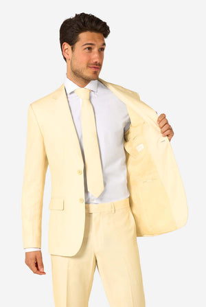 Elegant men's suit in a soft pastel yellow shade, perfect for weddings, summer events, and formal occasions. This stylish tailored suit features a slim fit design, notch lapels, and a matching tie for a sophisticated look. Ideal for modern gentlemen looking to make a statement with a light-colored pastel suit. Holding one side of the jacket open.