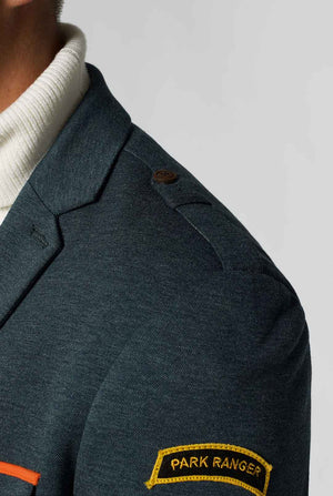 Green park ranger jacket worn by man