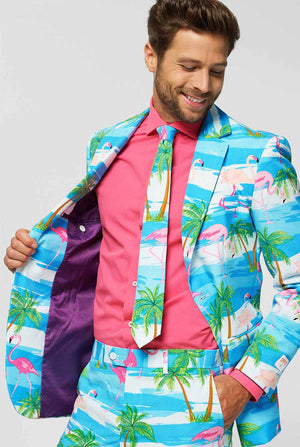 Blue and white men's suit with tropical flamingo print Flaminguy worn by man close up