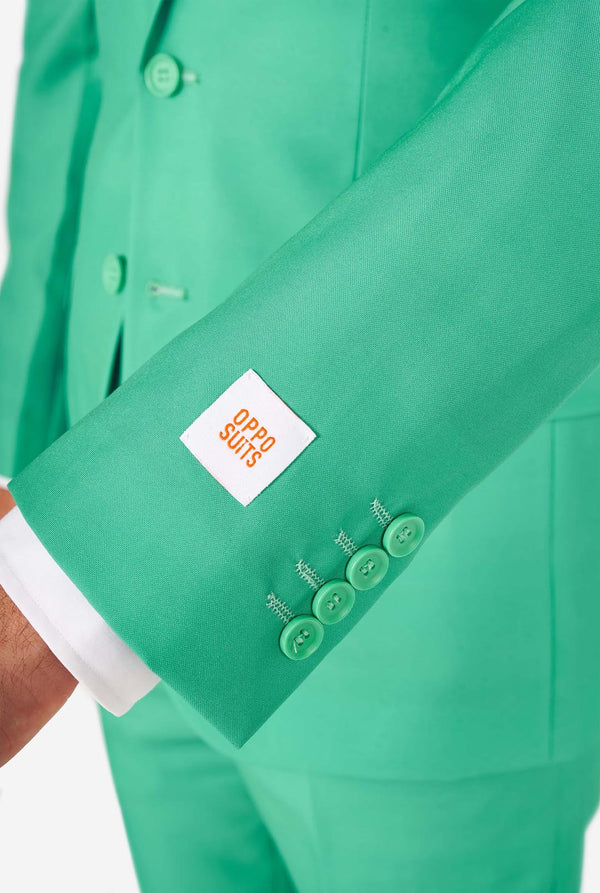 Man wearing turquoise colored suit, sleeve close up