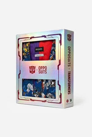 Box of Opposuits x Transformers themed suits with colorful packaging on a light background