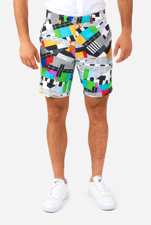 Man wearing summer suit with test screen print, pants close up