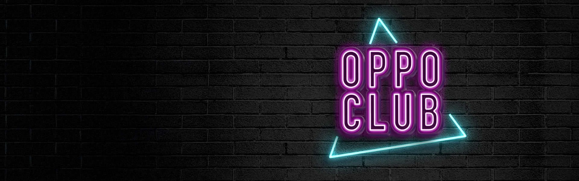 Image of the Oppo Club logo. Neon letters in front of a brick wall