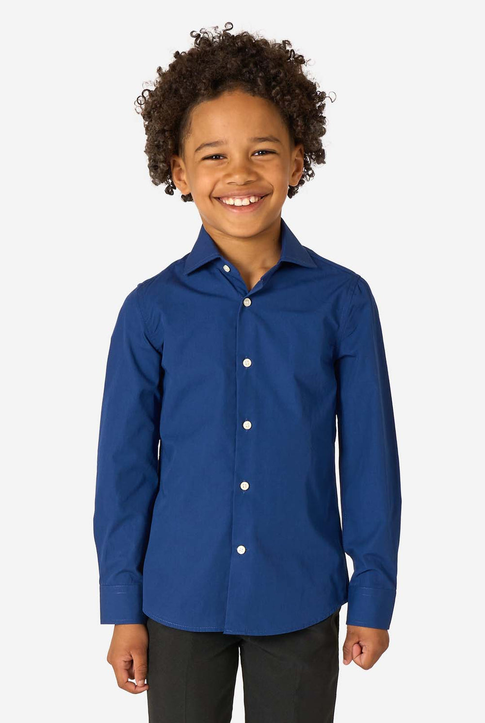 Little kid is wearing a blue shirt and a black pants.