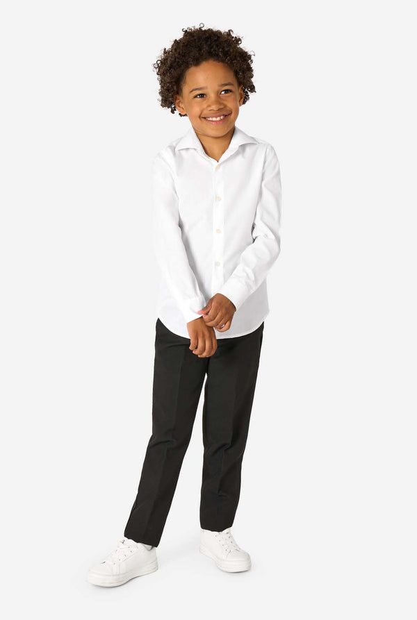 Little kid wearing a white shirt and black pants. Full body image.