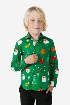 Child wearing a green Christmas-themed shirt with various festive designs on a white background