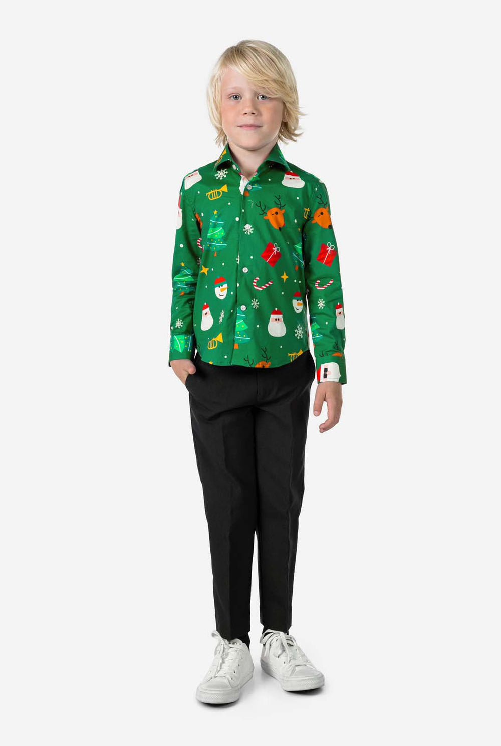 Child wearing a green Christmas-themed shirt with various festive designs on a white background