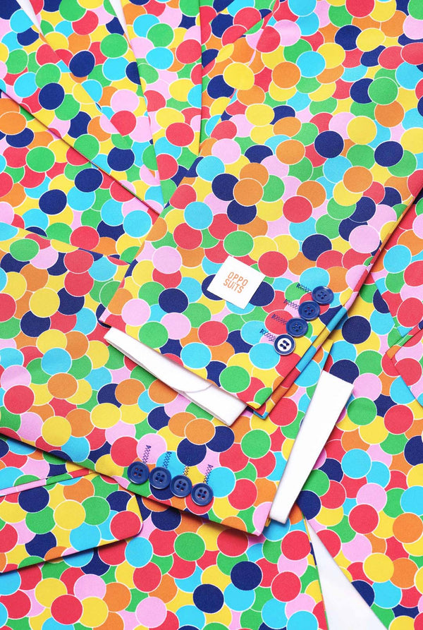Image of men's suit with multicolor all-over confetti print and white dress shirt. Suit consist of jacket, pants and tie.
