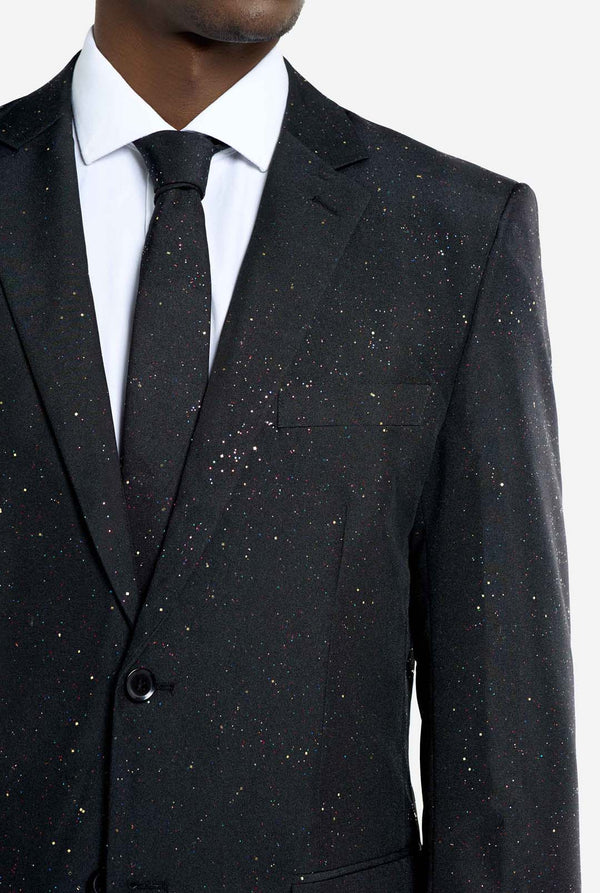 Image of a man wearing an OppoSuits Glitzy Glitter men's suit with glitters and white men's shirt. Suit consist of pants, jacket and tie. Chest close-up.