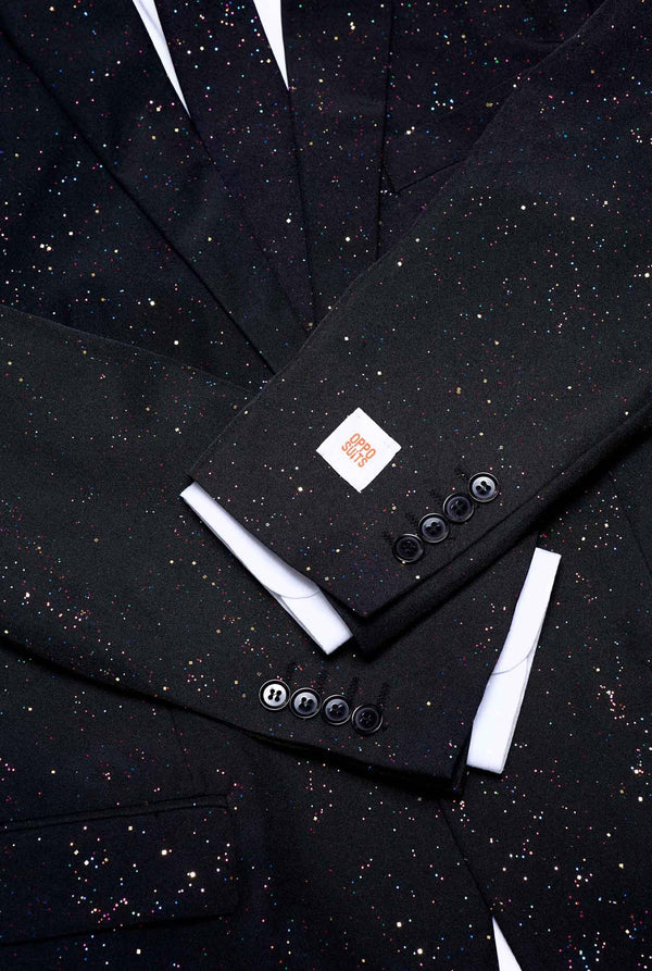 Image of an OppoSuits Glitzy Glitter men's suit with glitters and white men's shirt. Suit consist of pants, jacket and tie. Close-up.