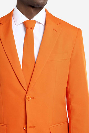 Orange suit jacket with a white shirt and tie on a light gray background