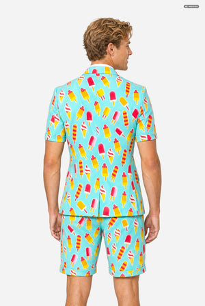 A man modeling a light blue three-piece suit with a colorful ice cream cone pattern, featuring a short-sleeve blazer, matching trousers, and a matching tie, set against a plain light gray background. Viwe from the back.