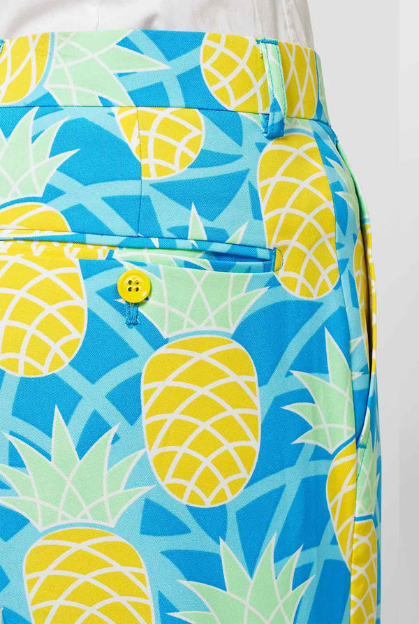 Man wearing blue summer suit with pineapple print. Close-up.
