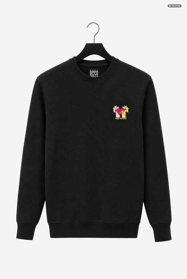 A black crewneck sweatshirt by OppoSuits, featuring a small colorful embroidered MTV graphic on the left chest, hanging on a black hanger against a light gray background.