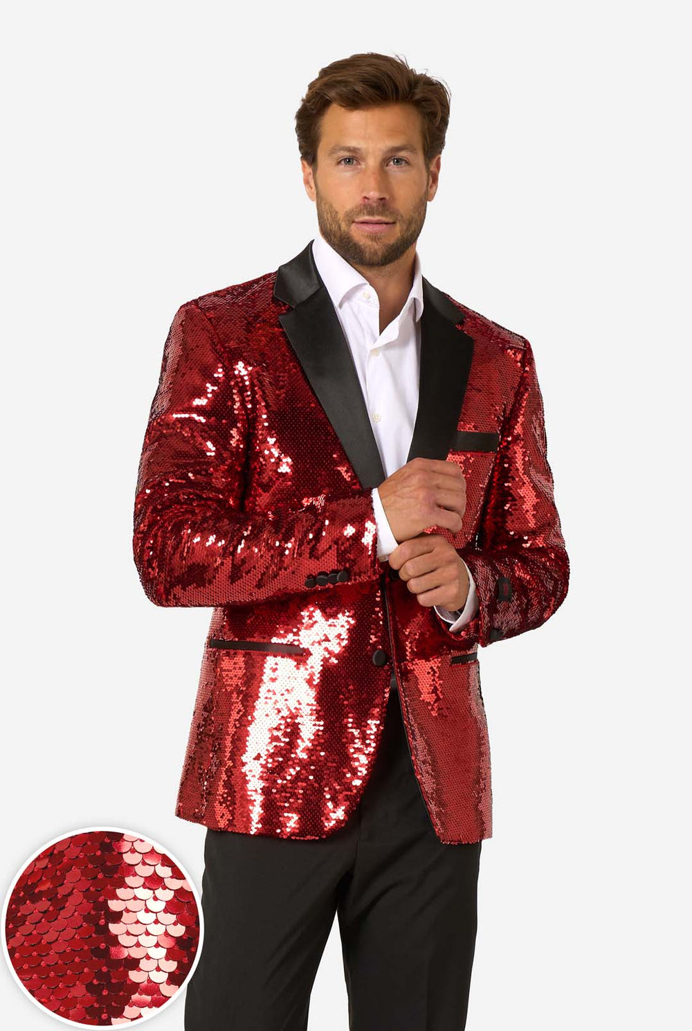 Man wearing a red sequin jacket with black lapels on a white background