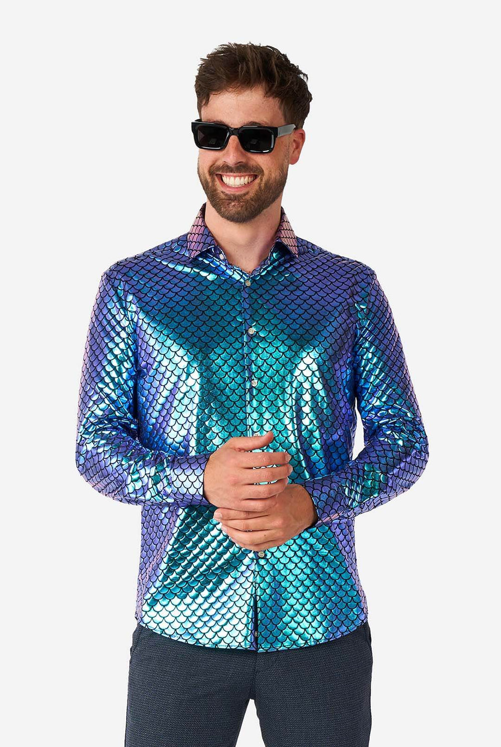Man wearing blue fishscale print shirt