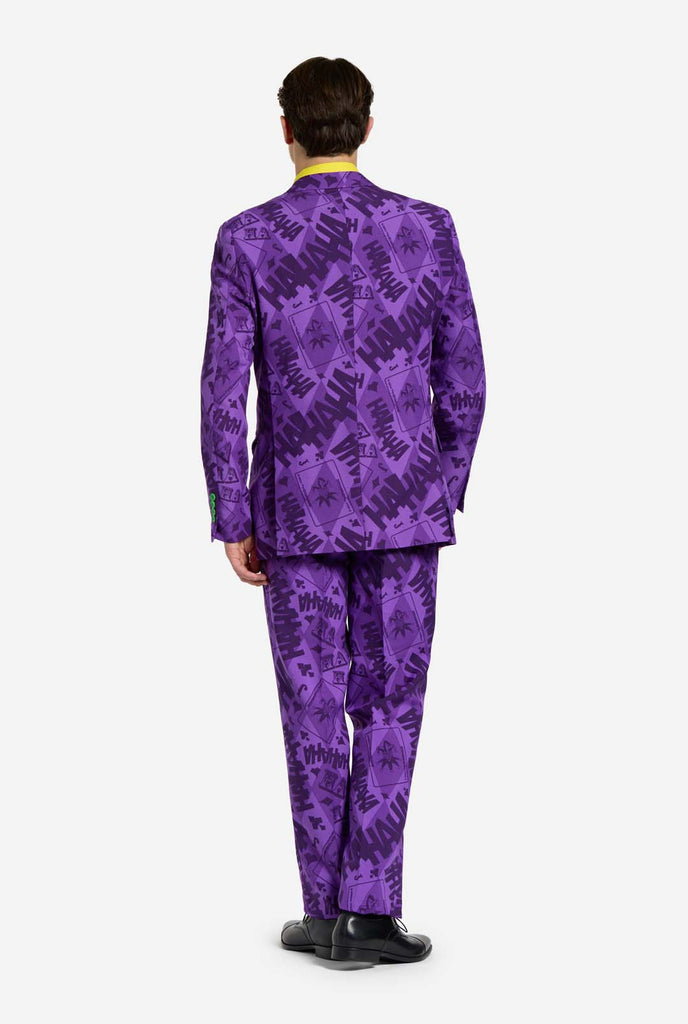 The Joker purple men's suit and yellow shirt worn by man, view from the back