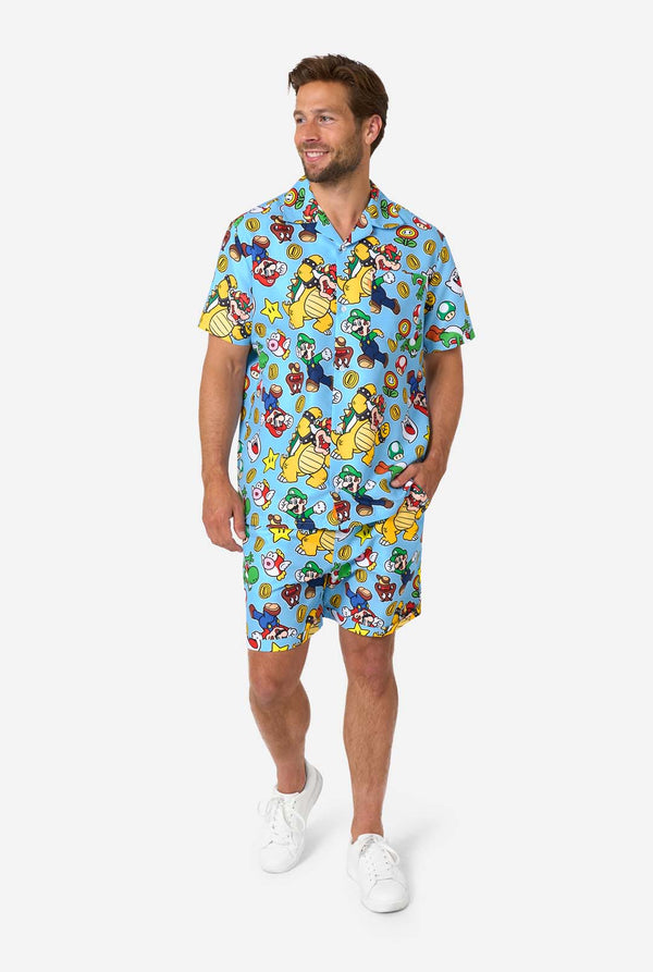 Man wearing a colorful Mario-themed shirt and shorts set on a light background. Full body image.
