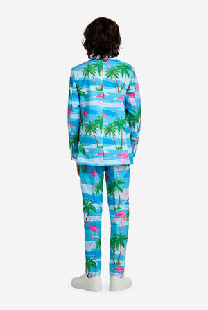 Person wearing a tropical-themed outfit with palm trees and flamingos on a white background, view from the back