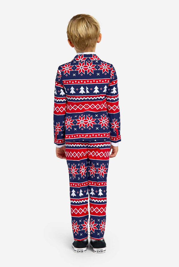Kid wearing Christmas suit with Nordic print, view from the back