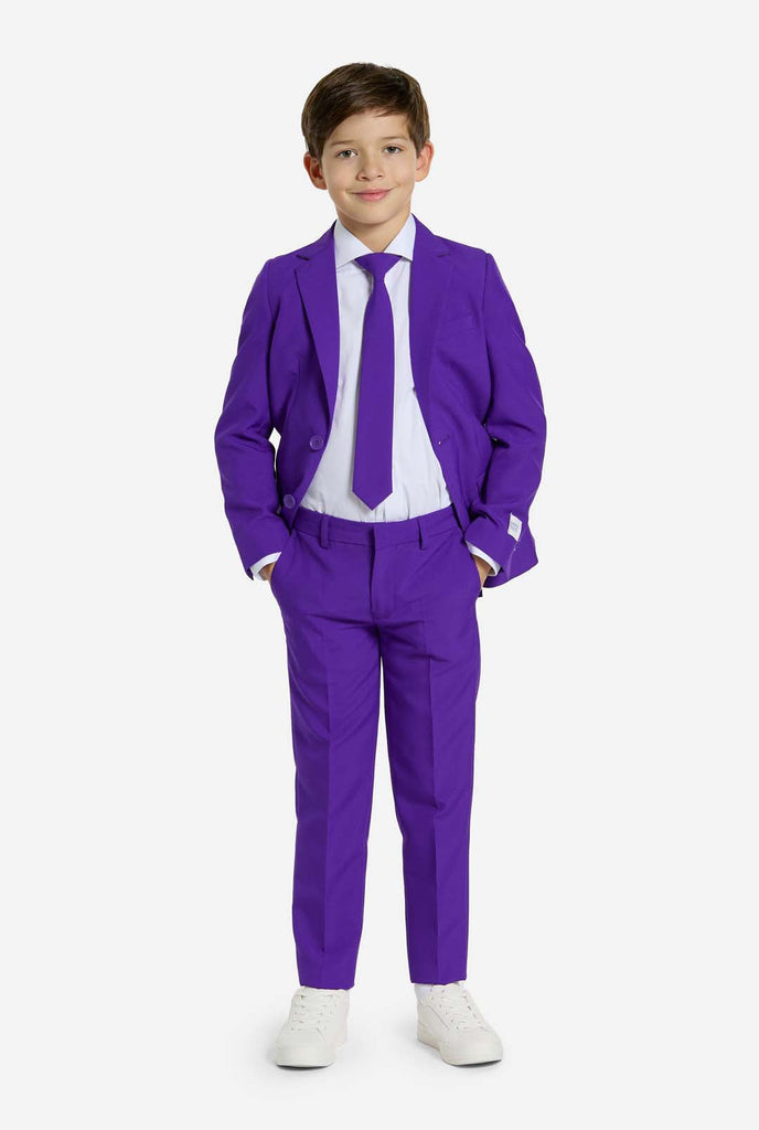 Kid wearing purple boys suit.