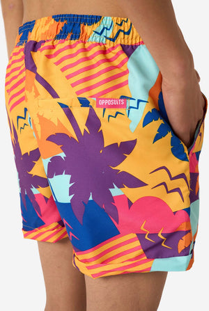 Colorful swim shorts with a palm tree design and 'Apposuits' branding.