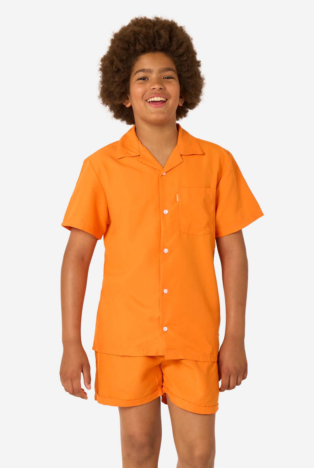 Person wearing an orange shirt and shorts summer set on a white background
