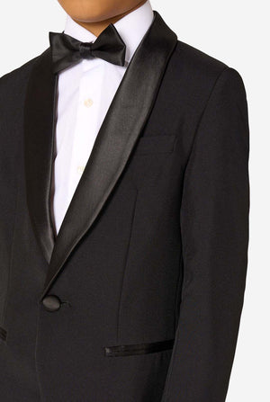 Black tuxedo with a bow tie on a white background. Chest close up.