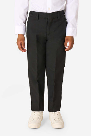 Person wearing black pants and white shoes on a white background