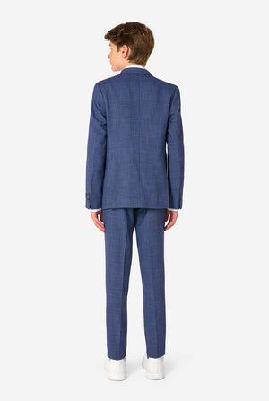 A teen boy wearing a navy and blue checkered suit with a white dress shirt. The suit has a modern fit with two buttons and flap pockets. He stands against a plain white background. View from the back