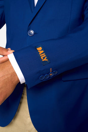 Blue suit jacket with a brand label on a white background