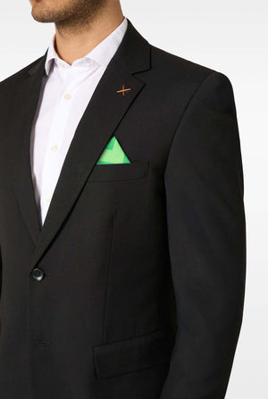 Close-up of the upper part of a black blazer with an orange stitch pin and a bright green pocket square.