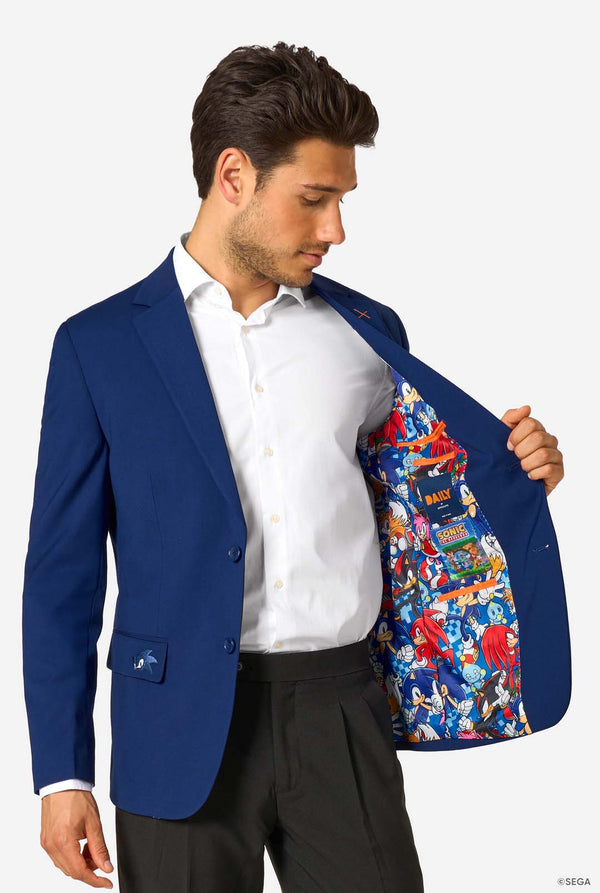A man showing the inside of a blue blazer with a colorful lining featuring Sonic the Hedgehog and other characters.