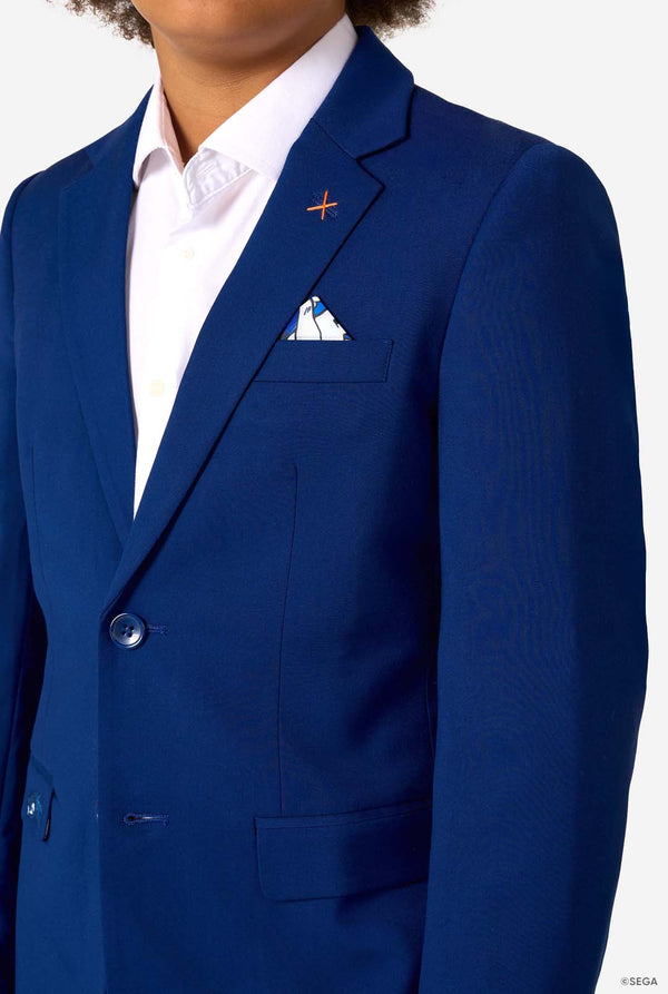 Close-up of the upper blazer showing an orange stitch detail and a white patterned pocket square.