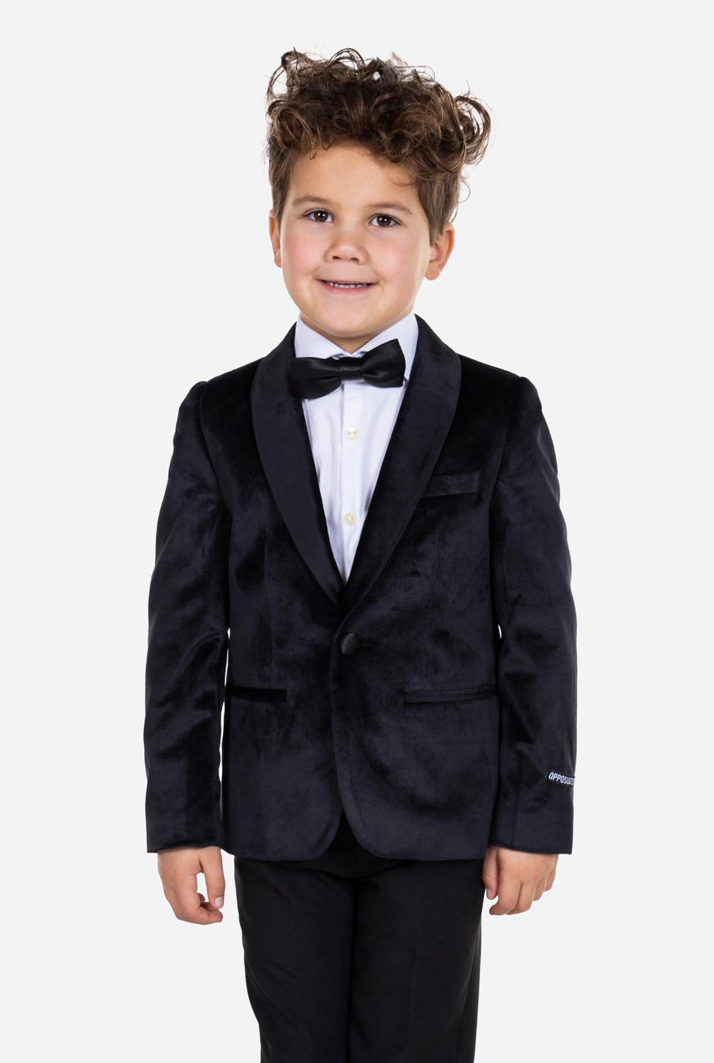Kid wearing black velvet dinner jacket for boys