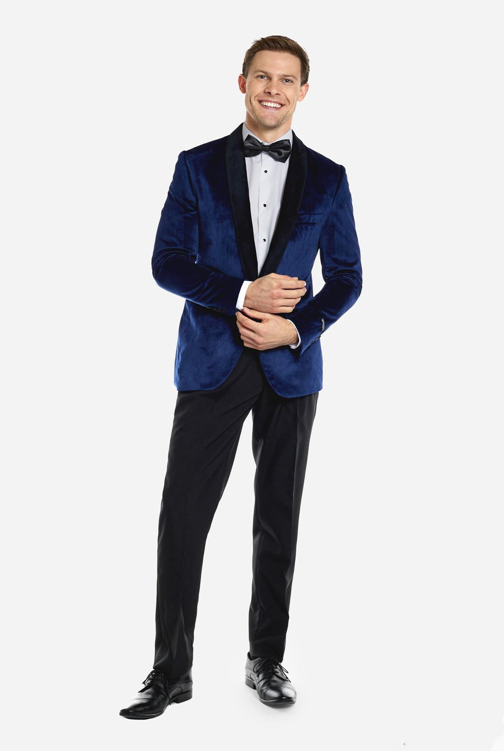 Blue velvet dinner jacket worn by man