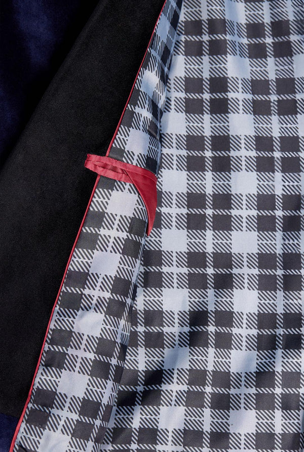 Blue velvet dinner jacket worn by man, close up inside