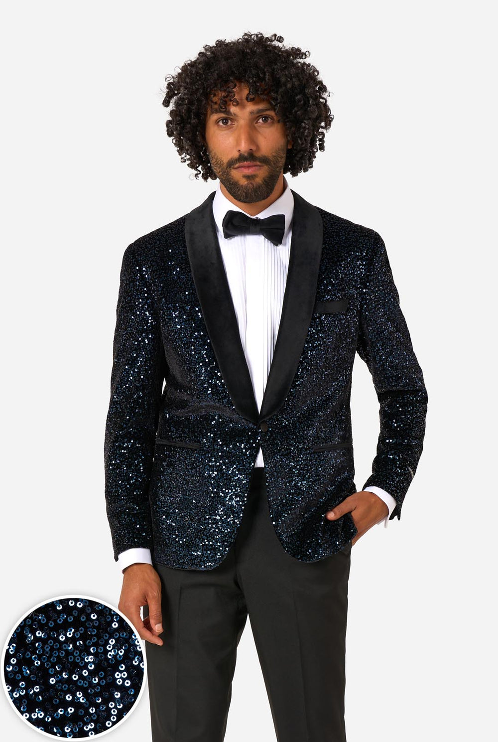 Man wearing a navy sequin blazer over a black pants and white shirt on a light background. Including close-up in left corner.