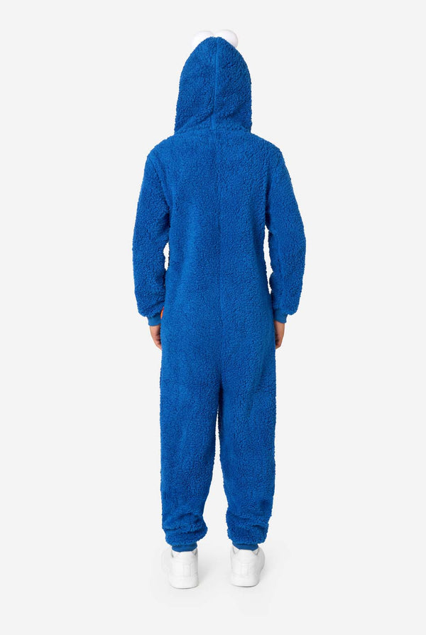 A kid is wearing a blue sesame street onesie resembling Cookie Monster. View from the back.