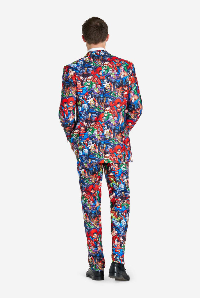 Man wearing mens suit with DC Super Heroes print, view from the back