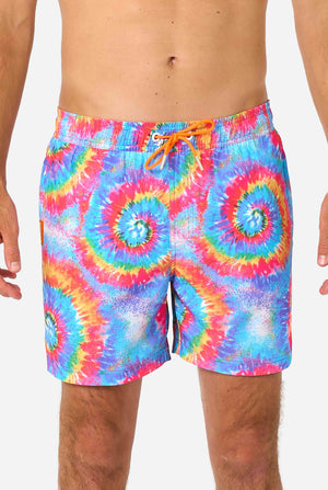 Man wearing a men's rainbow tie-dye swim shorts with a bold, colorful spiral pattern. A fun and trendy choice for beach days and pool parties. Close-up middle.