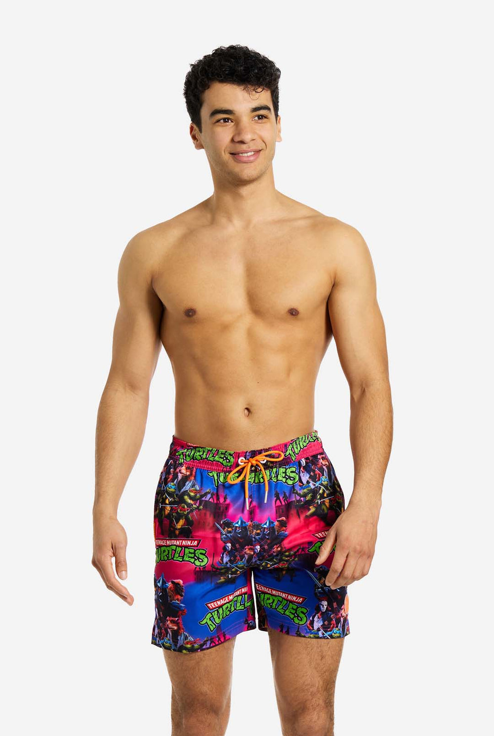 Man wearing TMNT Dude swim trunks for men, close up