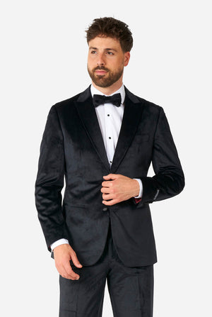 Man wearing black velvet tuxedo