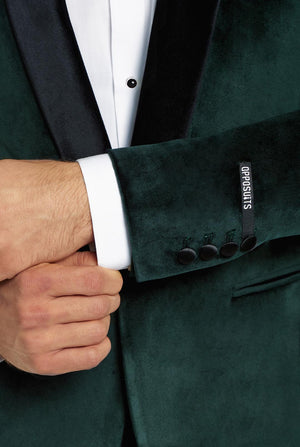 Man wearing dark green dinner jacket blazer